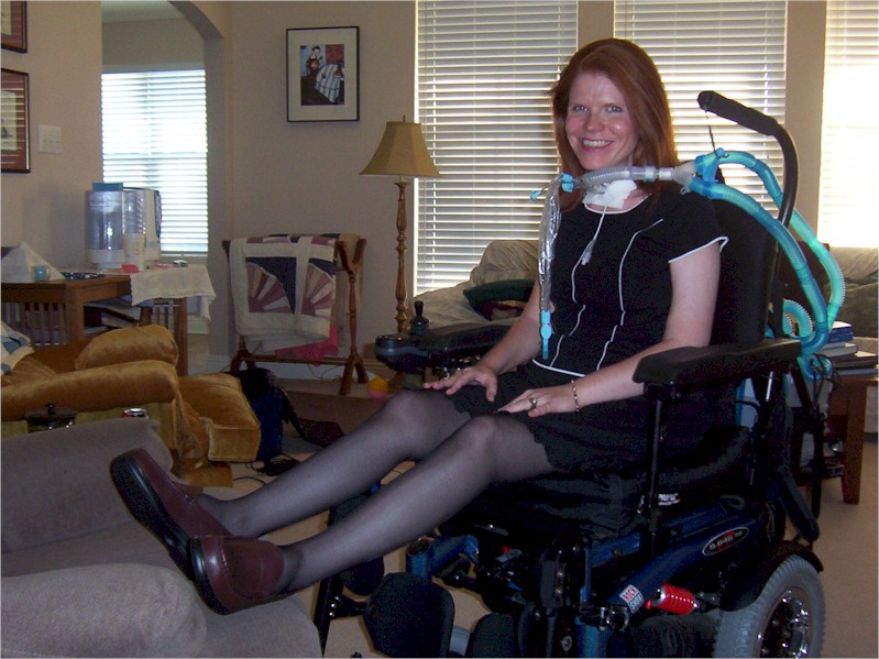 Deshae in her power wheelchair